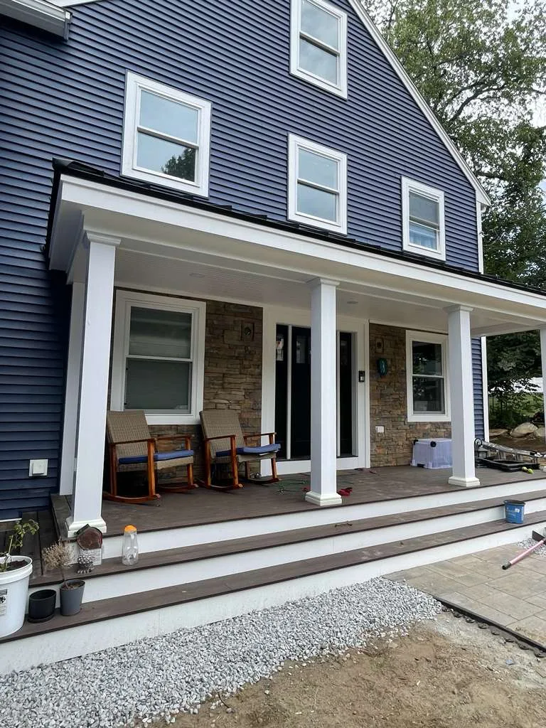 vinyl siding and stone facade in Leominster MA with covered front porch view